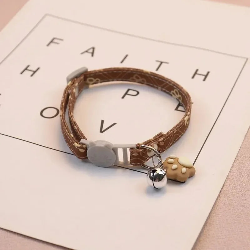 🐾 Adjustable Cute Footprint Breakaway Cat Collar with Bell